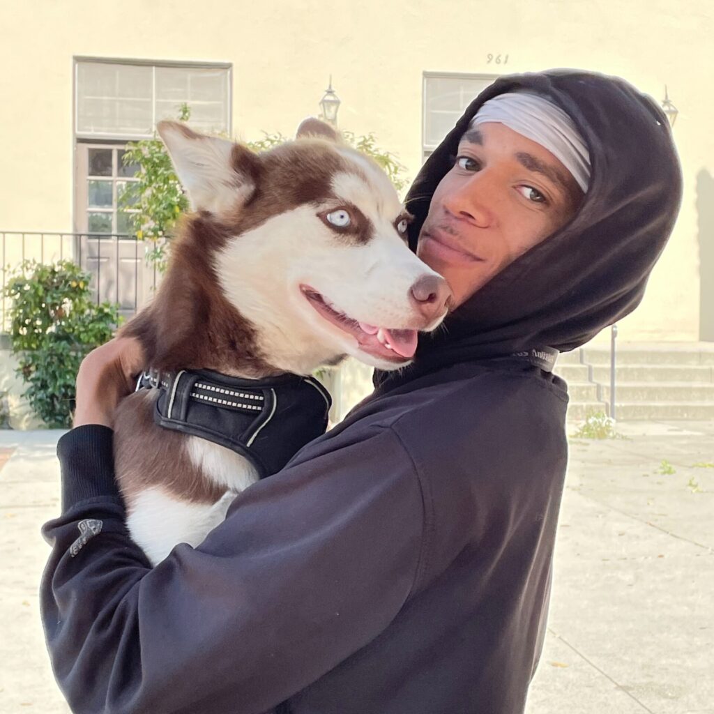 Participant Terrance with his pet husky