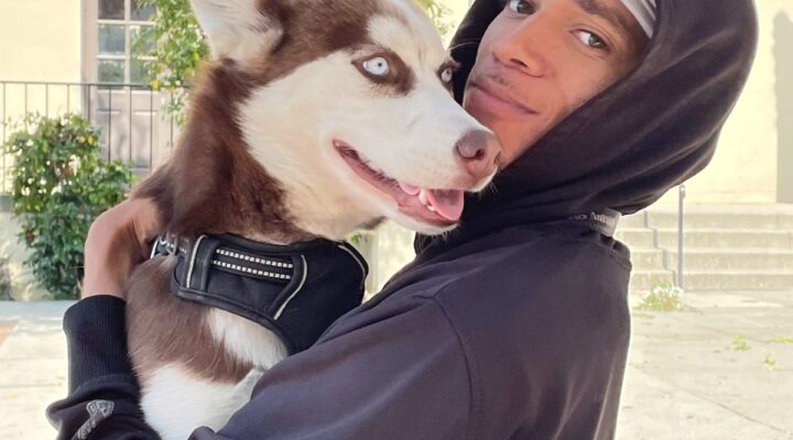 Participant Terrance with his pet husky